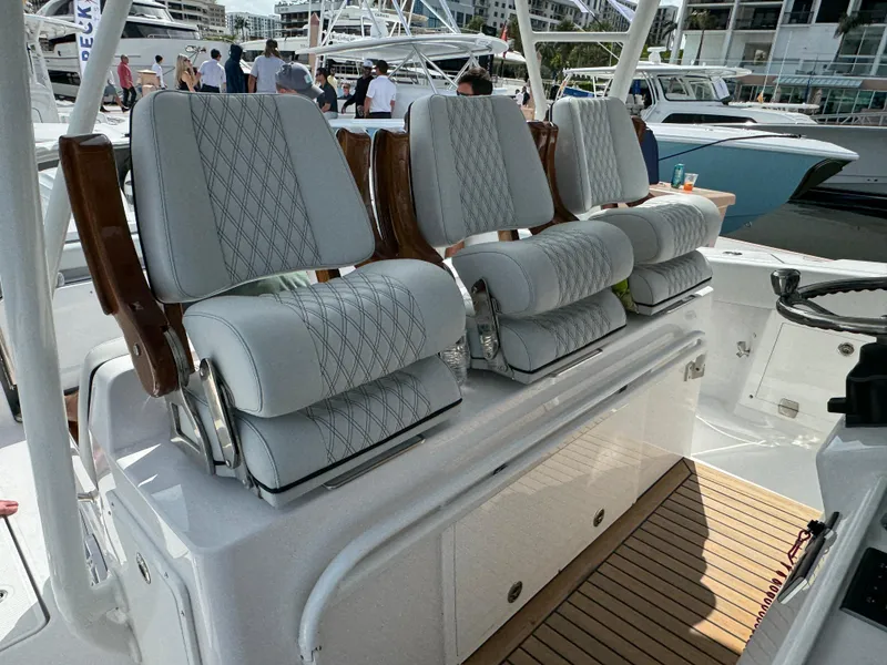 Slide: The Image of Luxurious seating on 2025 Southport 38 FE boat, featuring elegant design and craftsmanship. - 18