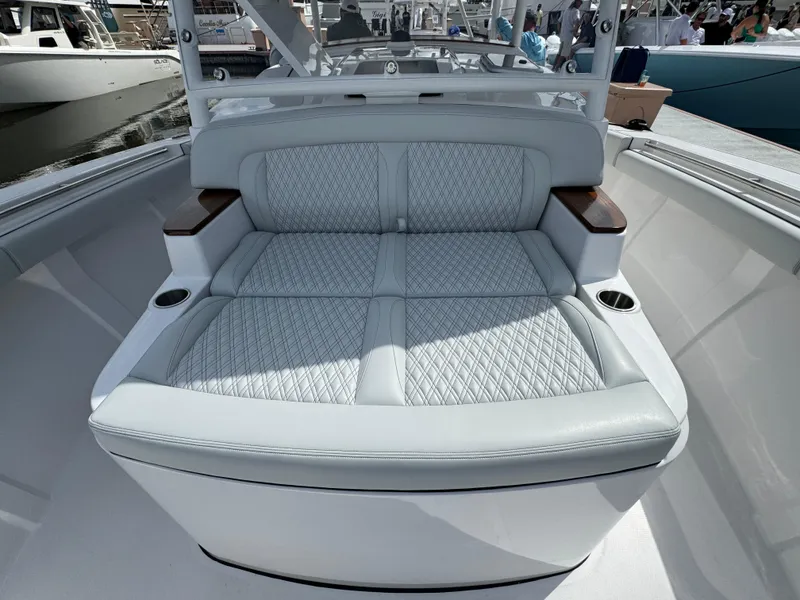 Slide: The Image of 2025 Southport 38 FE boat with luxurious seating and elegant design. - 20