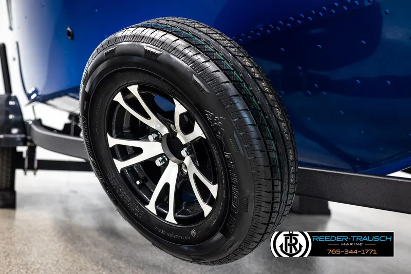 Slide: The Image of 2025 Lund Rebel XL SS trailer tire with sleek alloy wheel design. - 38