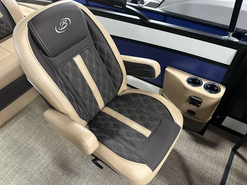 Slide: The Image of Luxurious seating in 2025 Barletta Lusso 23UC boat, featuring elegant design and cup holders. - 13