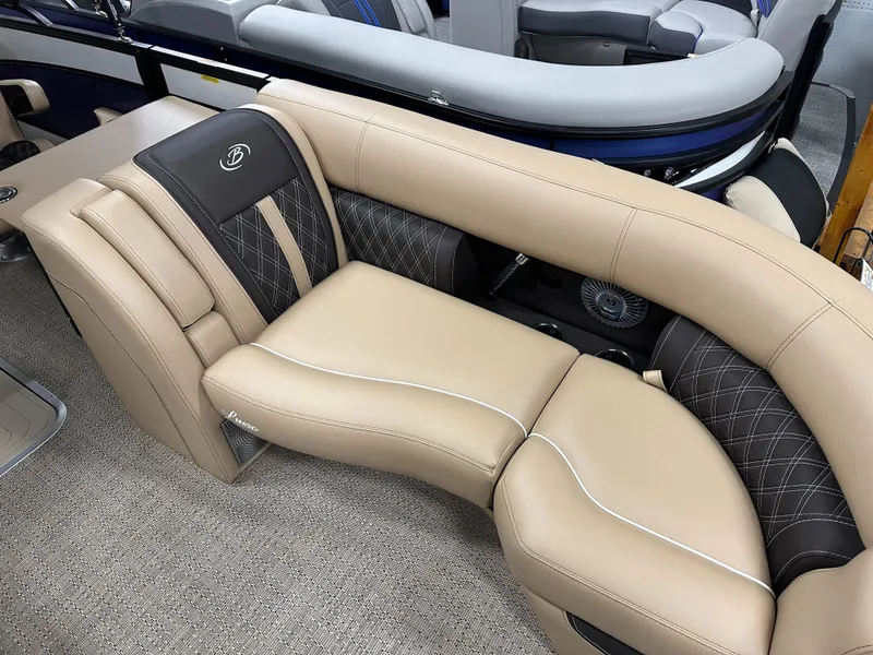 Slide: The Image of Luxurious seating on 2025 Barletta Lusso 23UC pontoon boat, featuring elegant beige and black upholstery. - 7