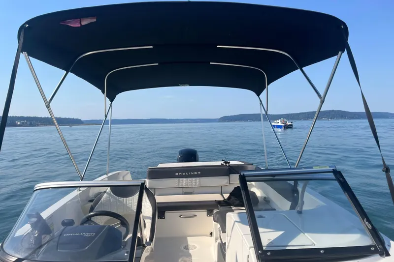 Slide: The Image of 2021 Bayliner VR6 Bowrider OB dashboard with gauges and navigation system. - 15