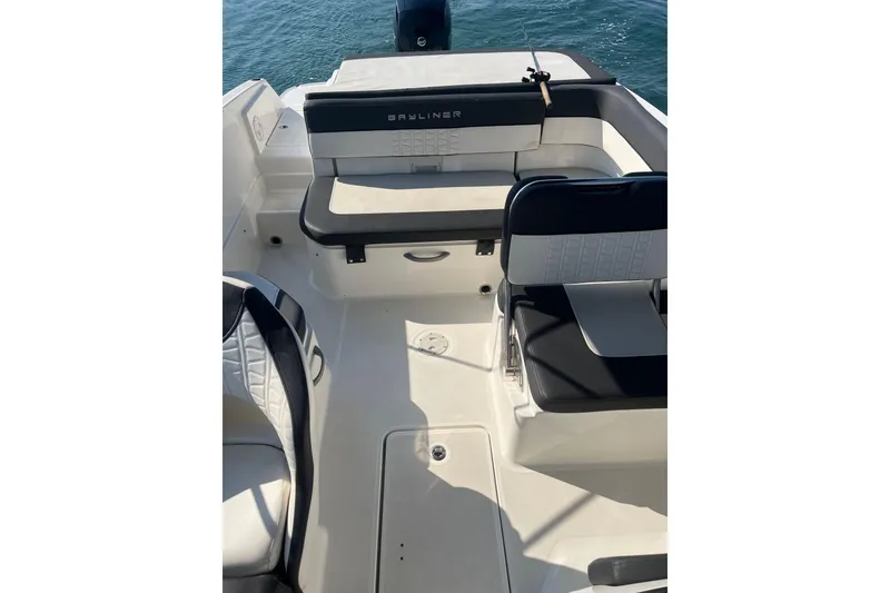 Slide: The Image of 2021 Bayliner VR6 Bowrider OB dashboard with steering wheel and navigation instruments. - 17