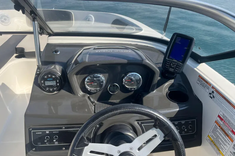 Slide: The Image of 2021 Bayliner VR6 Bowrider OB on trailer in indoor showroom. - 18