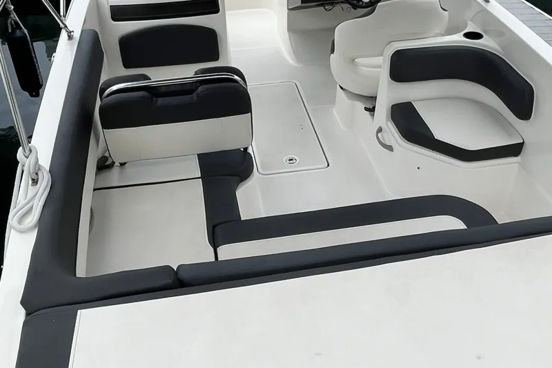 Slide: The Image of 2021 Bayliner VR6 Bowrider OB with Mercury outboard engine in a showroom. - 19