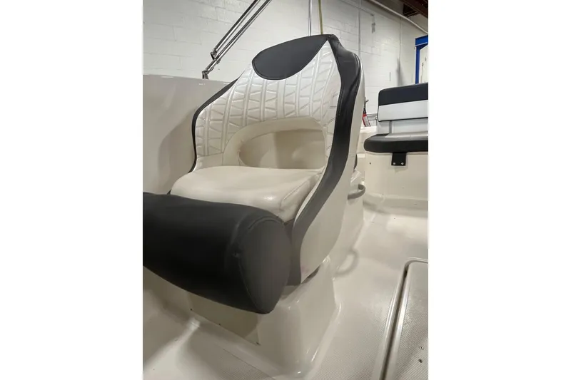 Slide: The Image of 2021 Bayliner VR6 Bowrider OB interior with sleek seating and modern design. - 9