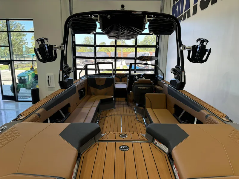 Slide: The Image of 2025 Nautique Super Air Nautique GS24 interior with luxurious seating and advanced features. - 9
