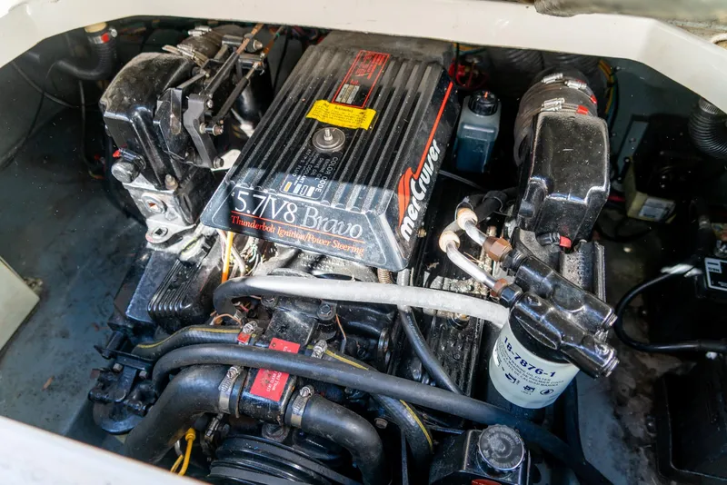 Slide: The Image of Engine compartment of a 1995 Sea Ray 250 Sundancer with MerCruiser 5.7L V8 engine. - 25