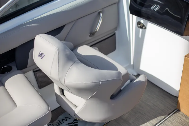 Slide: The Image of 2025 Four Winns HD3 boat interior with sleek, modern seating design. - 10