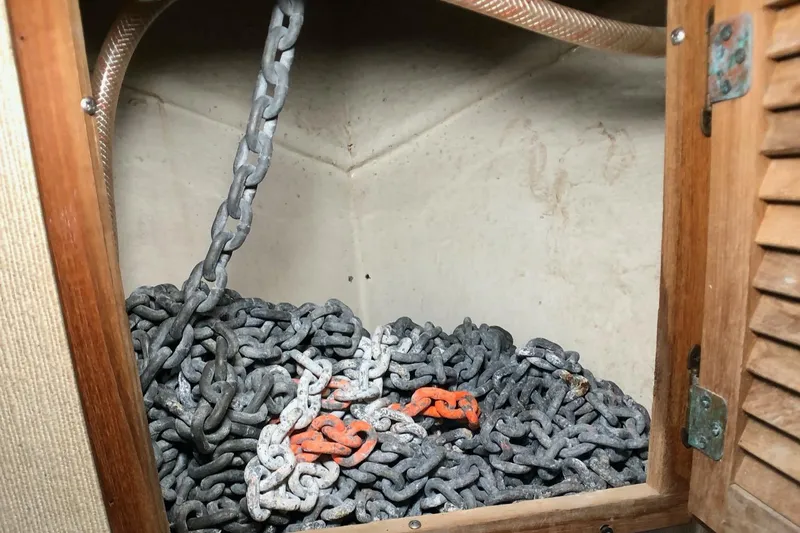 Slide: The Image of Anchor chain storage in 1989 Nordic Tug 32 boat compartment. - 27