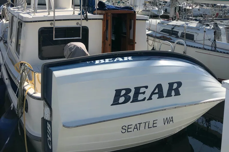 Slide: The Image of 1989 Nordic Tug 32 named "Bear" docked in Seattle marina. - 4