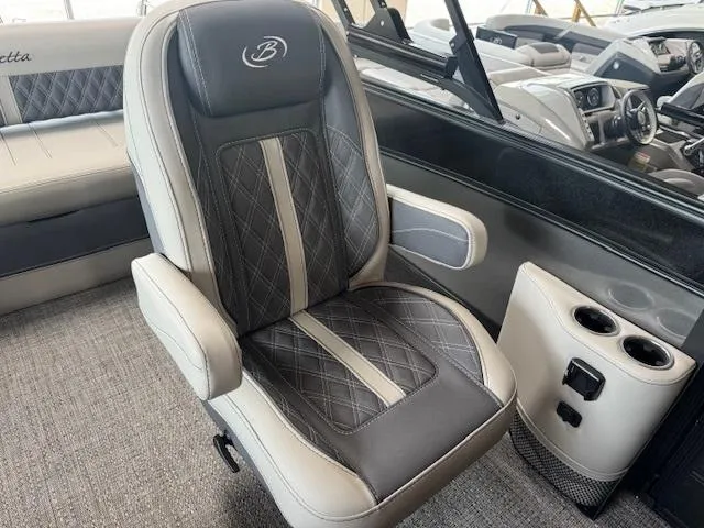 Slide: The Image of 2025 Barletta Lusso 23UC luxury boat seat with diamond stitching and cup holders. - 7