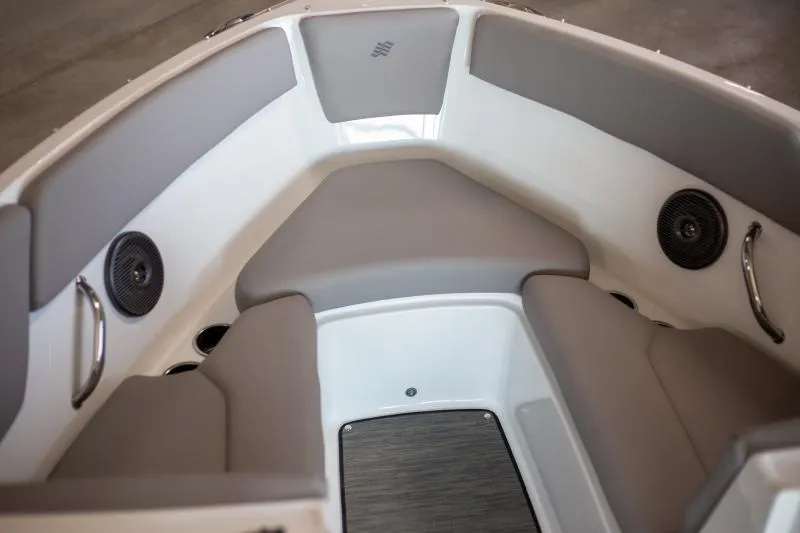 Slide: The Image of 2025 Four Winns H1 boat interior with gray seating and speakers. - 10