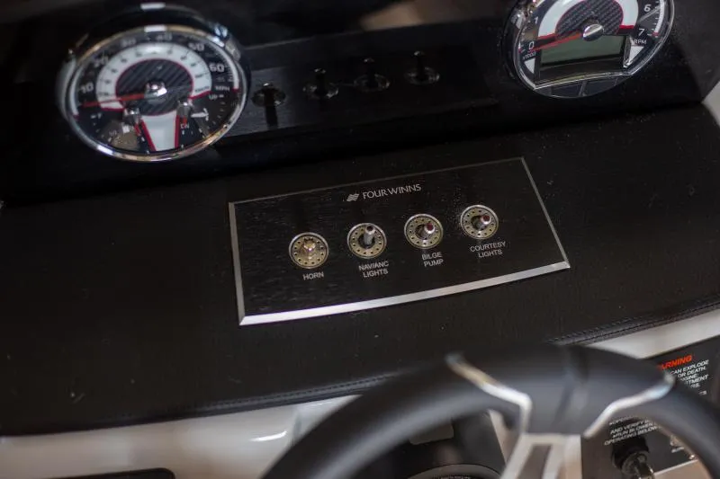 Slide: The Image of Dashboard of 2025 Four Winns H1 boat with control panel and gauges. - 3