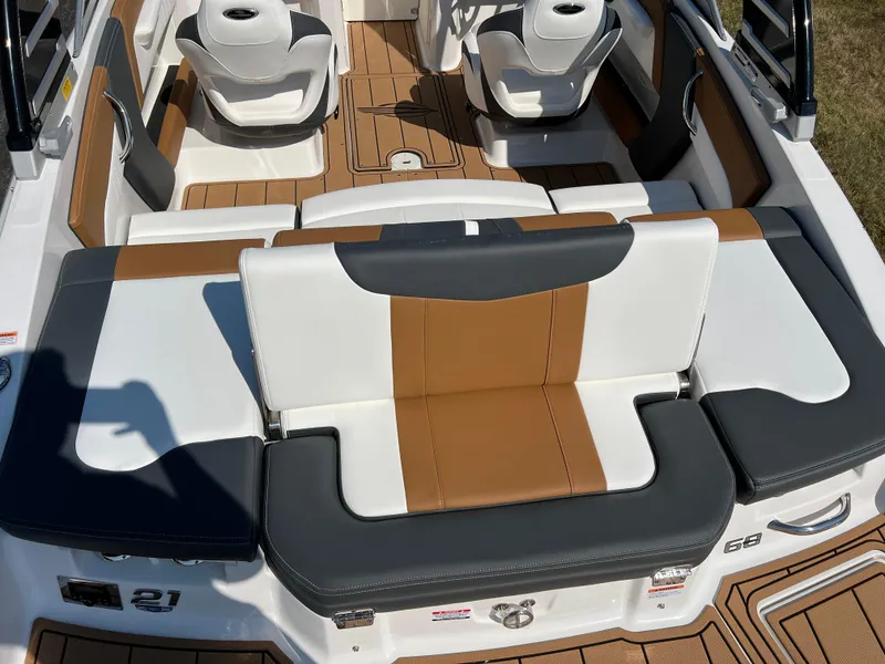 Slide: The Image of 2025 Chaparral 21 SSi boat interior with stylish seating and modern design. - 10