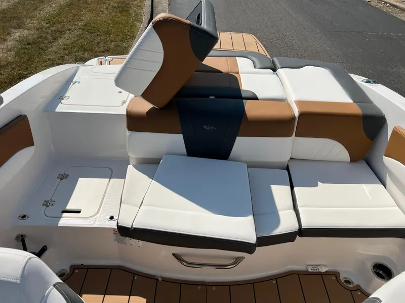 Slide: The Image of 2025 Chaparral 21 SSi boat interior with adjustable seating and modern design. - 25