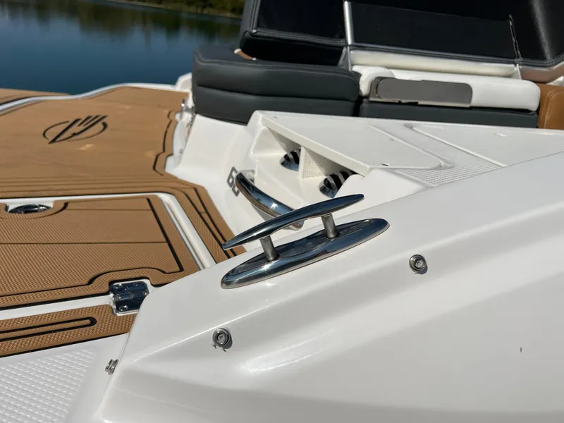 Slide: The Image of 2025 Chaparral 21 SSi boat deck with sleek design and modern features. - 34