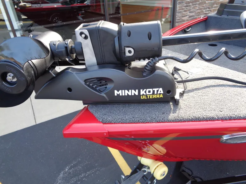 Slide: The Image of Minn Kota Ulterra motor on 2025 Lund 1650 Rebel XL SS boat, red exterior. - 18
