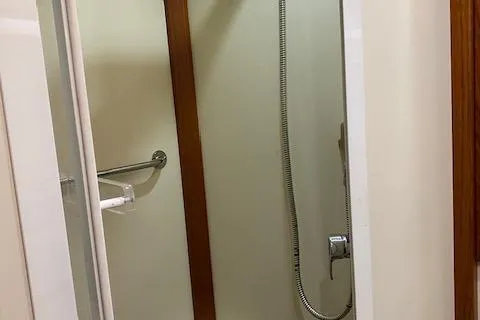 Slide: The Image of Shower area in 2001 Grand Banks 49 Eastbay SX yacht bathroom. - 24