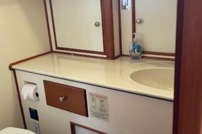 Slide: The Image of Luxurious bathroom vanity in 2001 Grand Banks 49 Eastbay SX yacht. - 26