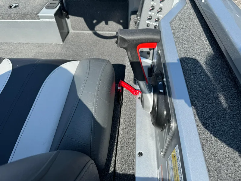 Slide: The Image of Vexus AVX1980 2025 boat interior with control lever and seat detail. - 15