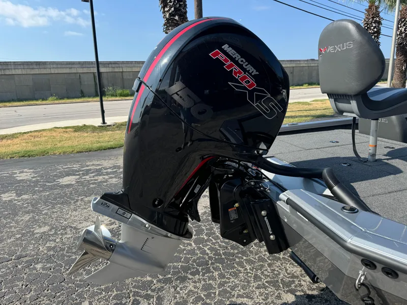 Slide: The Image of 2025 Vexus AVX1980 boat with Mercury Pro XS outboard motor. - 2