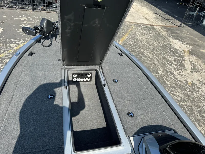 Slide: The Image of 2025 Vexus AVX1980 boat storage compartment with open lid, showing interior details. - 22