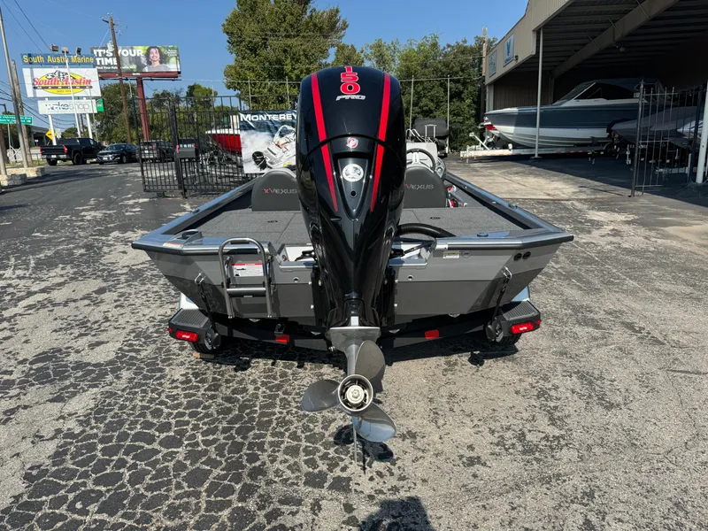 Slide: The Image of 2025 Vexus AVX1980 boat with powerful outboard motor, parked on asphalt. - 3
