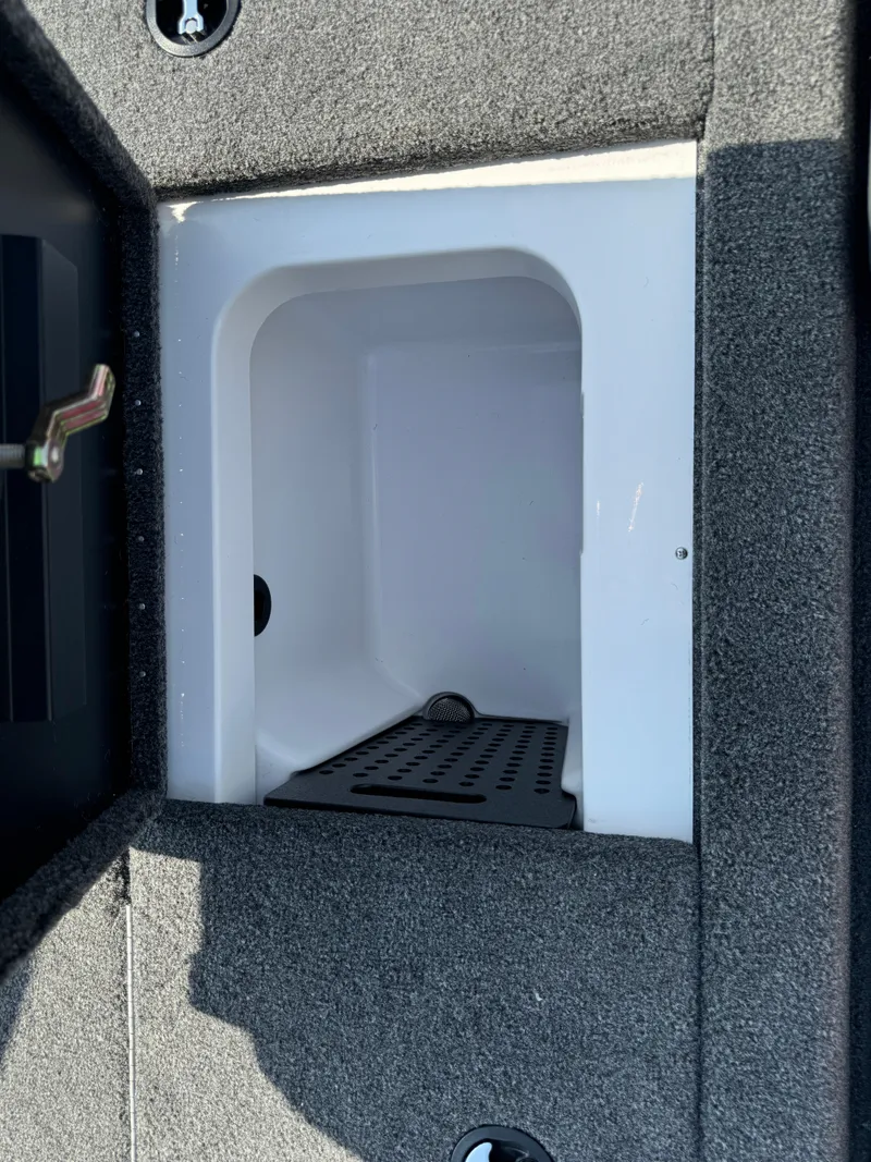 Slide: The Image of 2025 Vexus AVX1980 boat storage compartment with textured interior. - 34