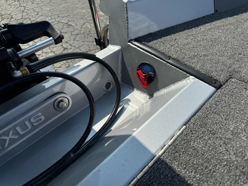 Slide: The Image of 2025 Vexus AVX1980 boat interior with control cables and carpeted flooring. - 39