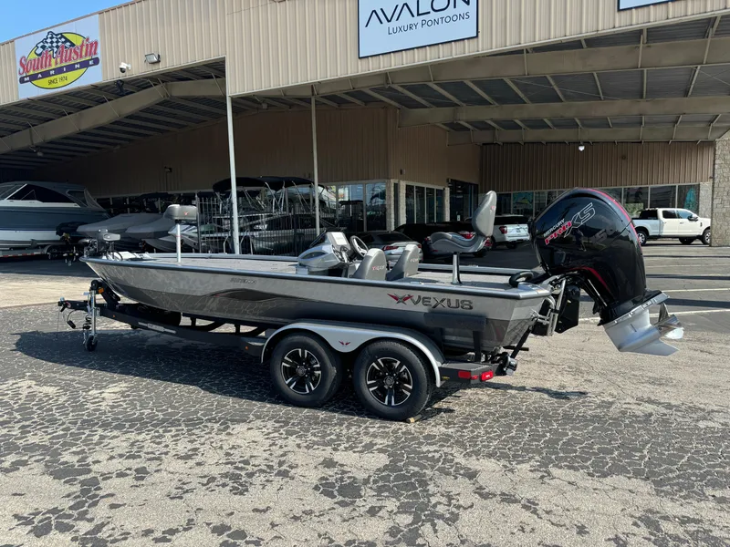 Slide: The Image of 2025 Vexus AVX1980 boat parked outside dealership, showcasing sleek design and modern features. - 4