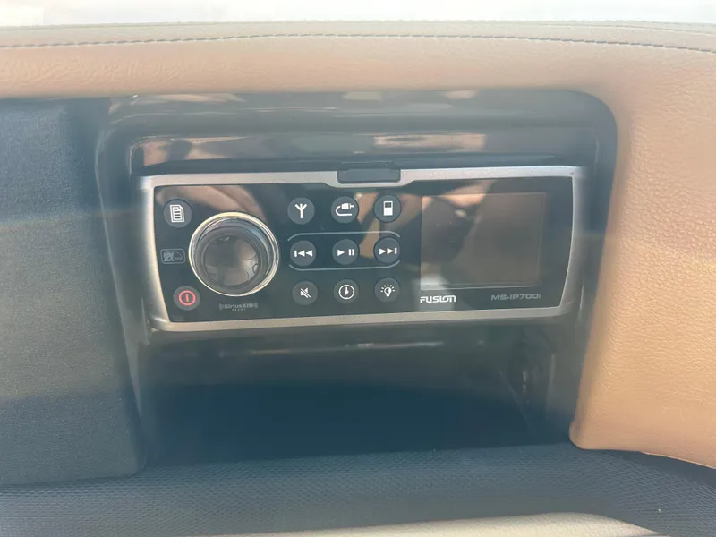 Slide: The Image of Fusion MS-IP700 stereo system in 2014 Sea Ray 270 SLX boat dashboard. - 14