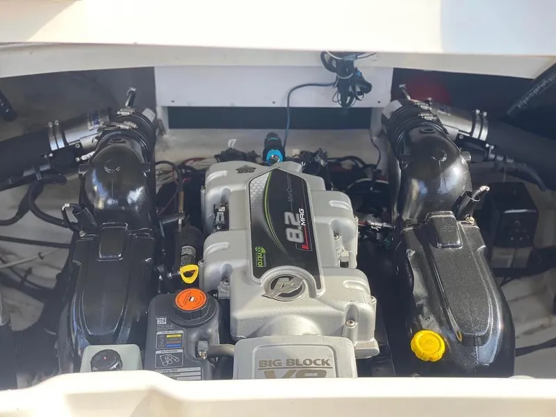 Slide: The Image of 2014 Sea Ray 270 SLX engine compartment with powerful V8 engine. - 18