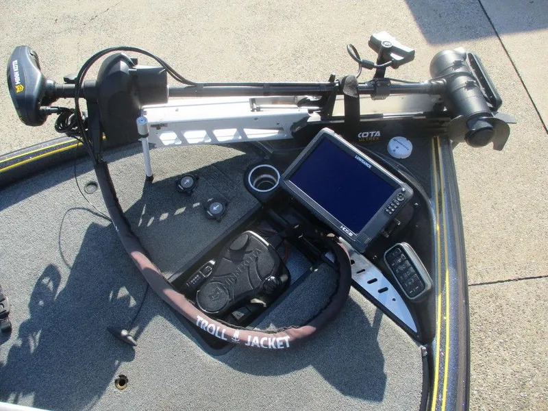 Slide: The Image of 2016 Triton 20 TRX boat dashboard with trolling motor and fishfinder. - 5