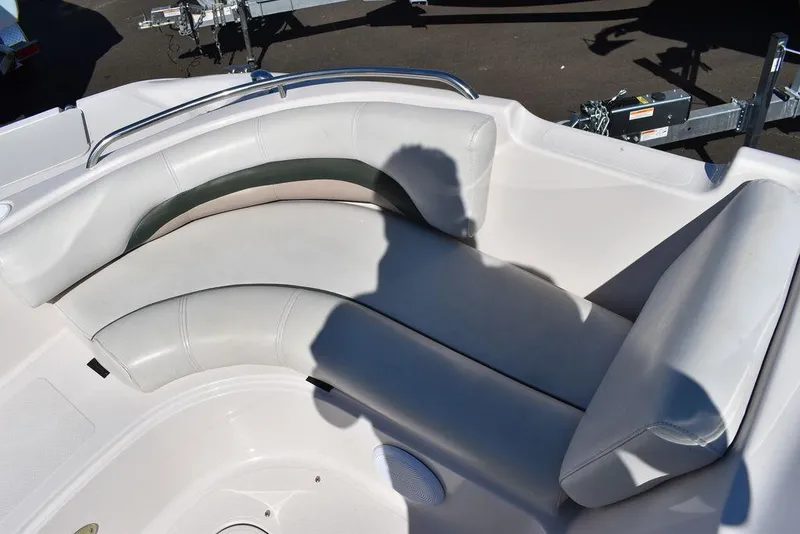 Slide: The Image of 2003 Hurricane SD 187 boat interior with curved seating and shadow. - 29
