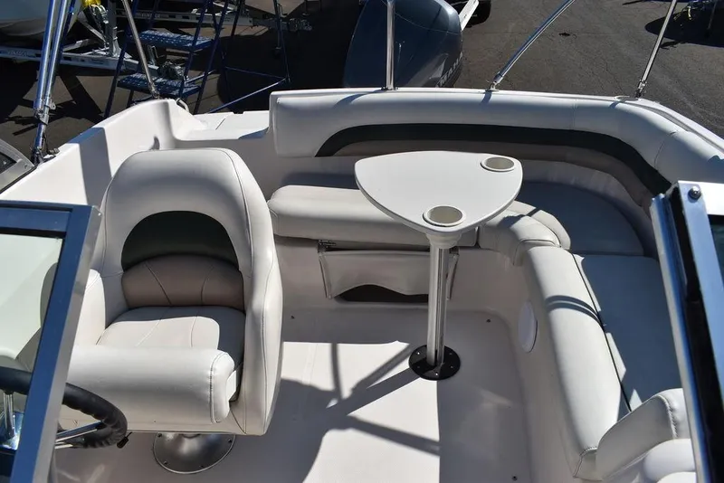 Slide: The Image of 2003 Hurricane SD 187 boat interior with seating and table. - 33
