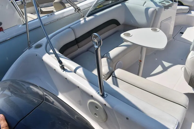 Slide: The Image of 2003 Hurricane SD 187 boat interior with seating and small table. - 37