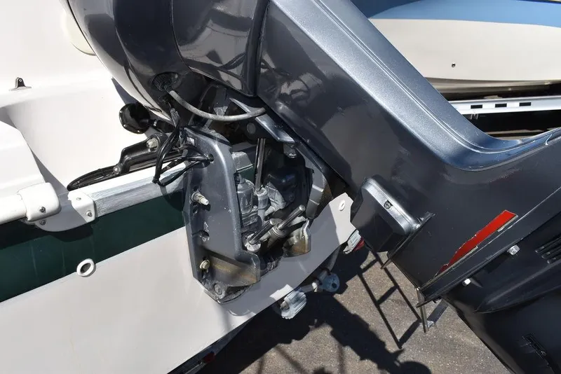 Slide: The Image of Outboard motor of a 2003 Hurricane SD 187 boat, showing engine mount and components. - 41
