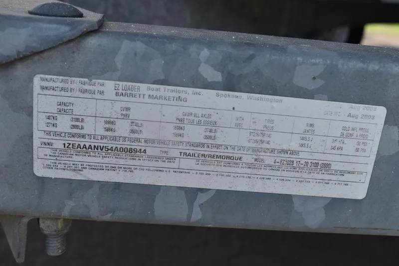 Slide: The Image of Label on a 2003 Hurricane SD 187 boat trailer, showing specifications and compliance details. - 48