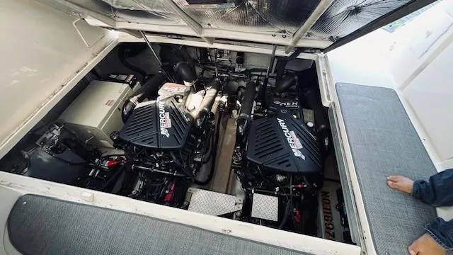 Slide: The Image of Engine compartment of 2005 Sea Ray 39 Sundancer with twin Mercury engines. - 15