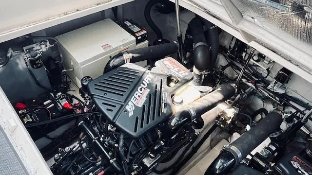 Slide: The Image of Engine compartment of 2005 Sea Ray 39 Sundancer with Mercury engine. - 16