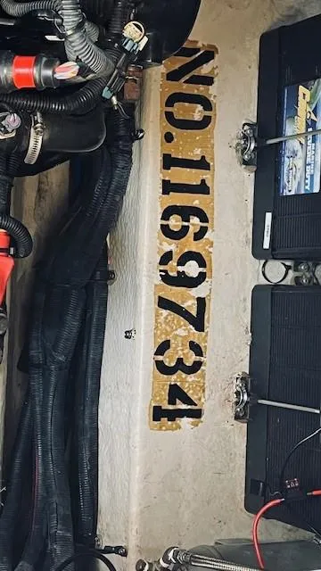 Slide: The Image of Engine compartment of 2005 Sea Ray 39 Sundancer with serial number 1169734. - 18