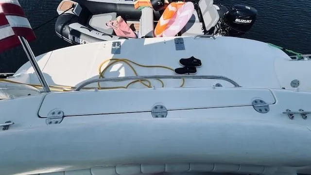 Slide: The Image of 2005 Sea Ray 39 Sundancer yacht with inflatable boat and accessories on deck. - 6