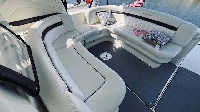 Slide: The Image of Luxurious seating area on a 2005 Sea Ray 39 Sundancer yacht, featuring plush cushions. - 9