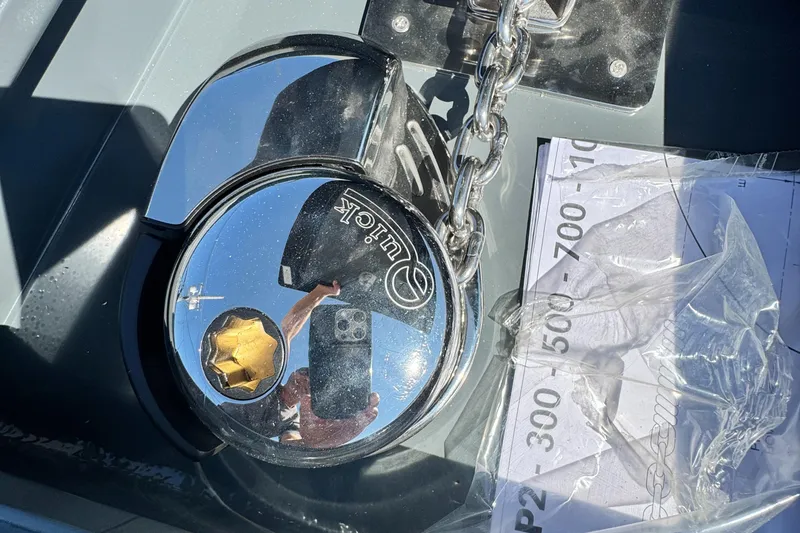 Slide: The Image of Close-up of a 2024 Highfield Sport 900 boat's anchor chain and winch. - 45
