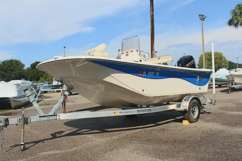 Slide: The Image of 2022 Carolina Skiff 17 LS boat on trailer in parking lot. - 3