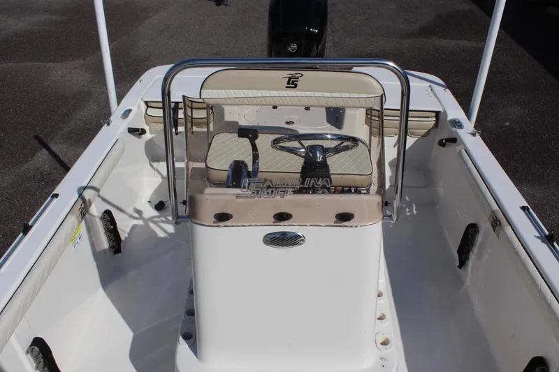 Slide: The Image of 2022 Carolina Skiff 17 LS boat interior with steering console and seating. - 30