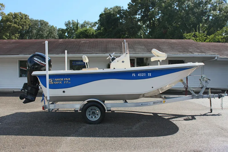 Slide: The Image of 2022 Carolina Skiff 17 LS boat on trailer, parked outdoors. - 6