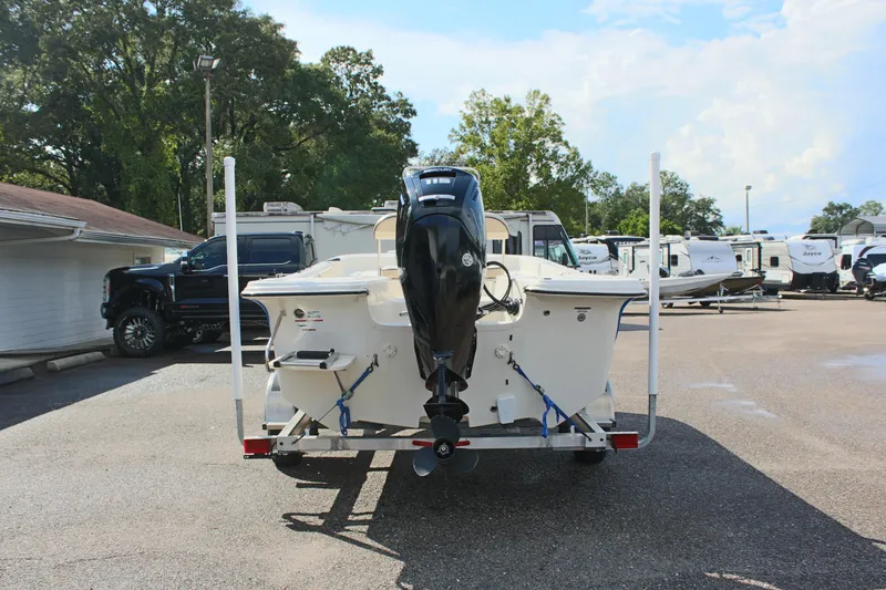 Slide: The Image of 2022 Carolina Skiff 17 LS boat on trailer, rear view in parking lot. - 9