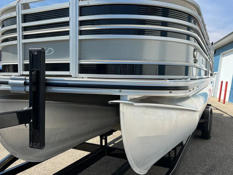 Slide: The Image of 2020 Harris FloteBote H SOL 250 CWDH TT pontoon boat on trailer, close-up view. - 12